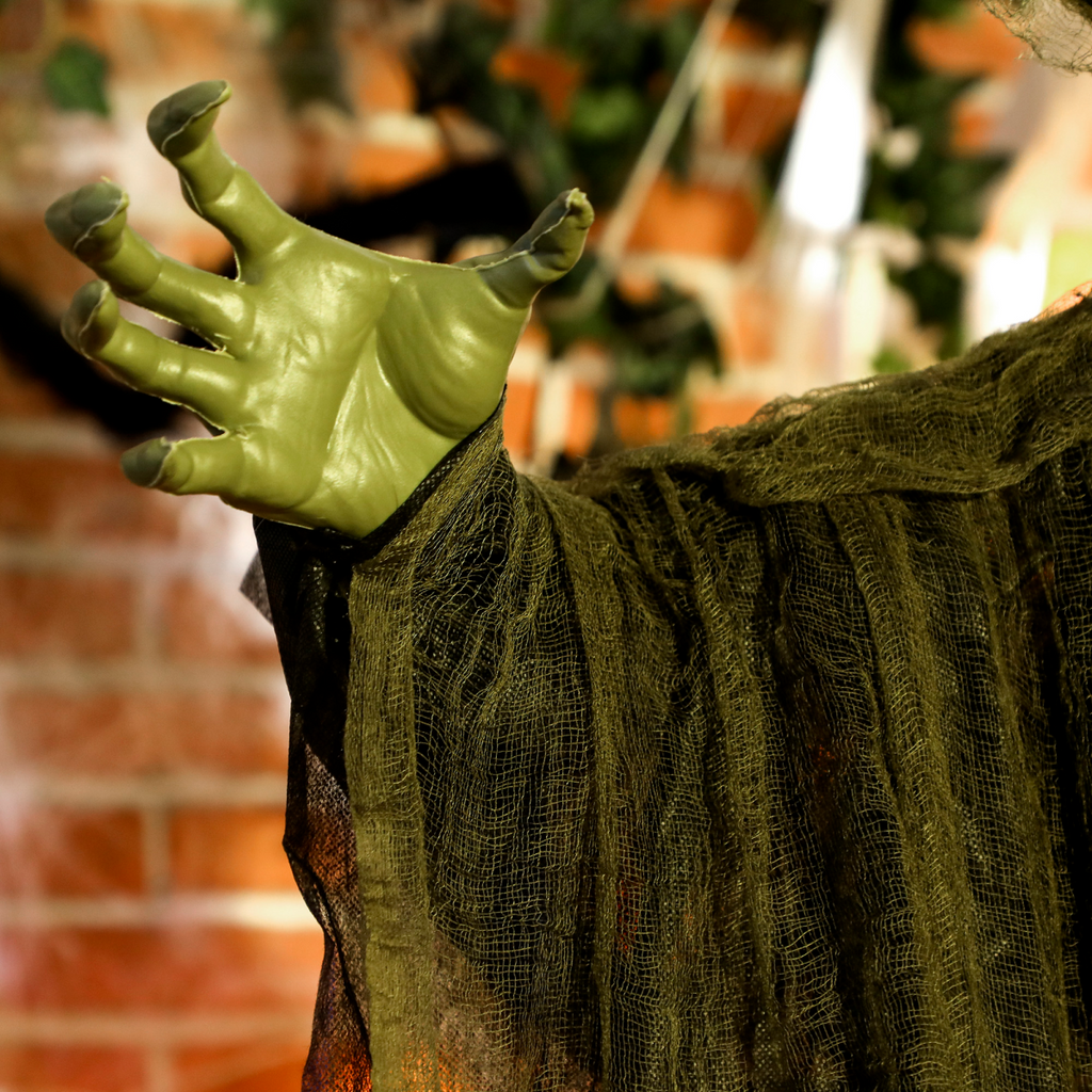 Voice-Activated Hanging Halloween Witch — Green