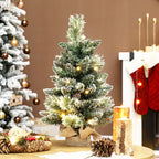 60 cm Prelit Small Christmas Tree, Snow Flocked Tabletop Mini Xmas Tree with 35 LED Lights, Pine Cones and Linen Cover Base, Battery Operated, Green